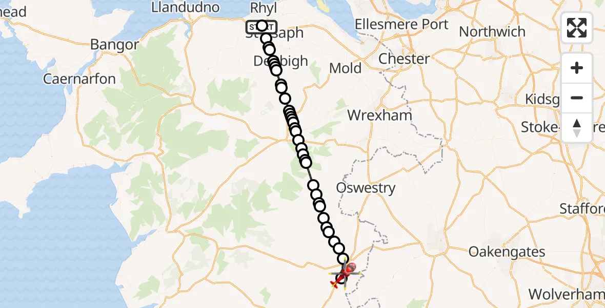Flight path map showing Air Ambulance Helicopter route from Ysbyty Glan Clywd Hospital Heliport to Welshpool Airport